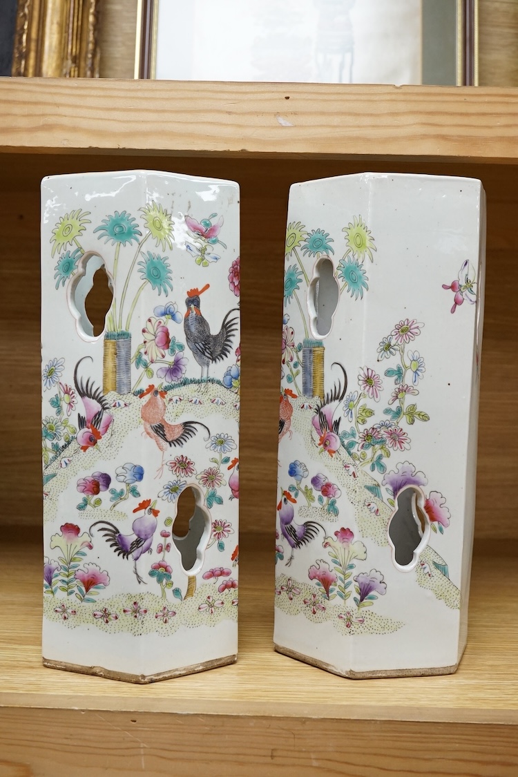 A pair of hexagonal Chinese famille rose porcelain hat stands, 30cm high